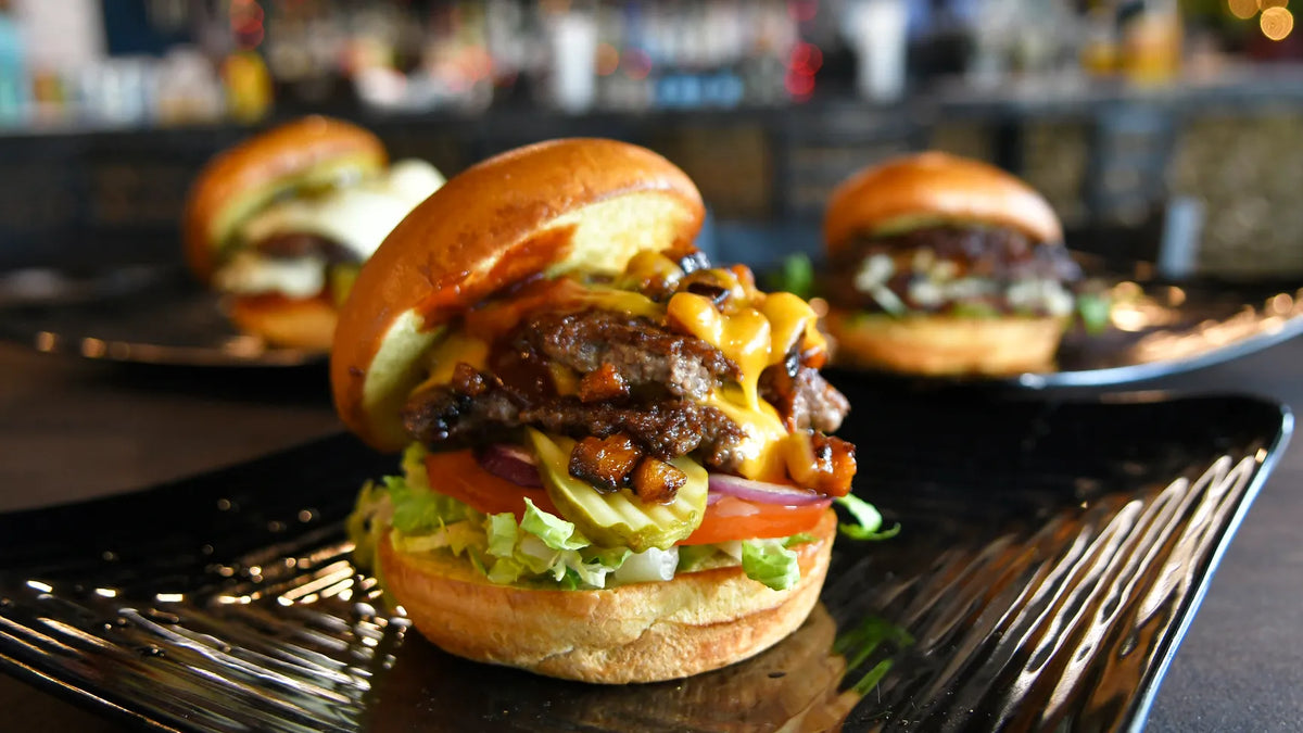 Double smash burger with melted cheese and pickles